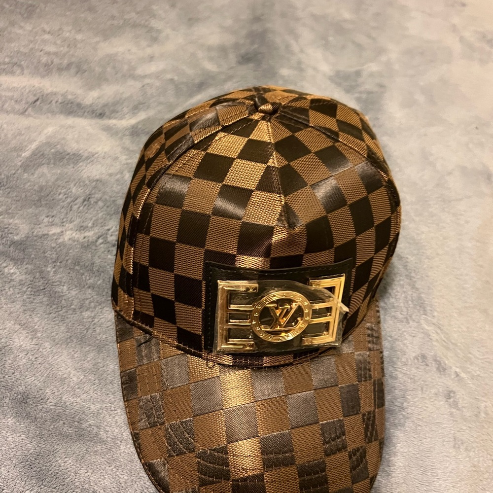 Louis Vuitton Brown Checkered Hat with Gold Emblem